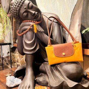 ***NOT MADE IN CHINA***
Longchamp bags